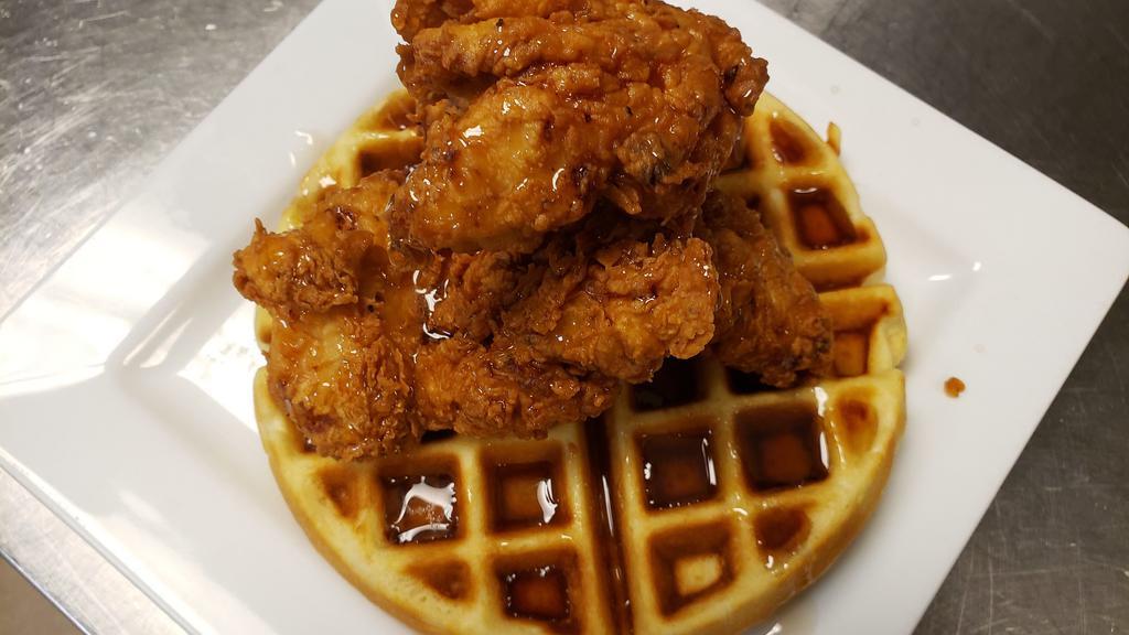 Southern Fried Chicken And Waffle · Southern fried chicken the old fashioned way! Buttermilk marinated and fried crispy and drizzled with honey. Served on a Homemade Belgian waffle with Butter, Maple syrup, and Hot sauce on the side.