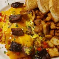 Ranchers Omelet · Beef brisket, grilled onion, red bell pepper, and Smoked cheddar cheese. Served with choice ...