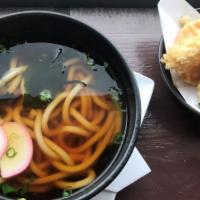 Tempura Udon · Shrimp and vegetable tempura, green onion, seaweed, and fishcake. served over udon soup.