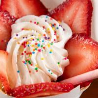 Strawberry Custard · Strawberries, custard cream, cornflakes, whipped cream, chocolate sauce.