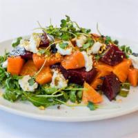Beet Salad · marinated red & gold beets, goat cheese, pistachios, arugula, micro radish sprouts, champagn...