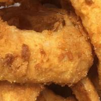 Onion Rings · Giant sweet vidalia onions, hand battered and fried to golden brown