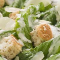 Caesar Salad · Romaine lettuce tossed with Caesar dressing, croutons, black pepper and Parmesan cheese.
