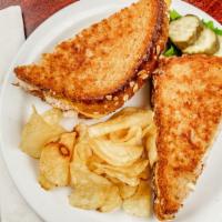 Tuna Melt Sandwich · Grilled 9 grain bread topped with homemade tuna salad and American cheese