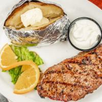 8 Oz Top Sirloin · An 8oz Black Angus sirloin grilled to your specifications served with a baked potato or vege...