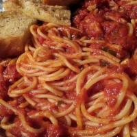 Spaghetti Arrabiata (Family) · Spaghetti tossed in a spicy red sauce with garlic, red pepper chill and fresh basil.