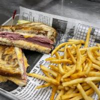Rueben · corned beef served on marble rye with swiss cheese, sauerkraut, and thousand island dressing