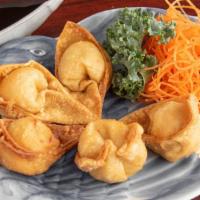 Crab Rangoon (5) · 5 pieces. Fried wonton filled with crab meat, celery, and cream cheese.