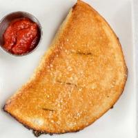 Pizza Calzone · Pepperoni, pizza sauce & lots o' cheese.