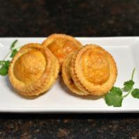 Pateso · Vietnamese puff pastry with ground beef.