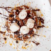 Rocky Road Cakes · nutella, pecans, marshmallow creme and caramel on chocolate chips cakes