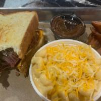 Brisket & Cheddar Sandwich · Sliced brisket served on texas toast topped with horseradish mayo and 2 slices of cheddar ch...