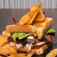 Smoked Club Sandwich · Brisket, turkey, and ham served on texas toast with red onion, cheddar, tomato, lettuce, and...