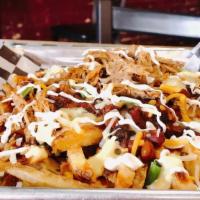 Loaded Chili Cheese Fries · Large order of seasoned fries, loaded with baked beans, cheese queso, your choice of 1/4 pou...