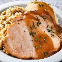Roast Turkey Meal · House Roasted Turkey Breast topped with Chicken Gravy, with Mashed Potatoes & Stuffing. Heat...