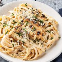 Chicken Alfredo Meal · Fettuccine Pasta tossed with Alfredo Sauce & topped with a Grilled Chicken Breast, & Parmesa...