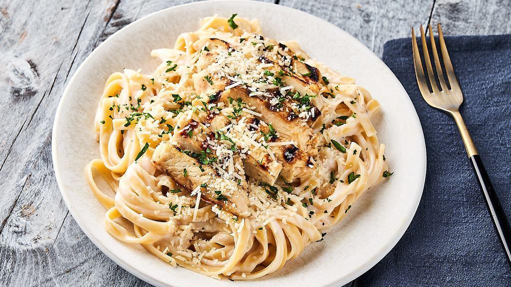 Chicken Alfredo Meal · Fettuccine Pasta tossed with Alfredo Sauce & topped with a Grilled Chicken Breast, & Parmesan. Heat & serve.