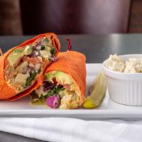 Hummus Wrap · House-made artichoke hummus, avocado, tomato, onions, cucumbers, feta, arugula, herb vinaigr...