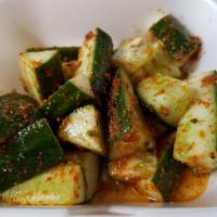 Salted Cucumber · Sliced cut cucumber with shichimi togarashi and sesame oil. Spicy.