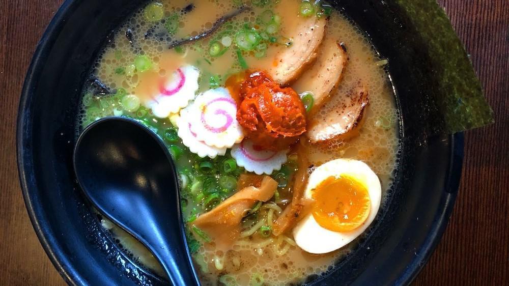 Char Siu Ramen · Roasted pork belly, fish cake, half cooked egg, bamboo shoot, fungus, green onion and black garlic oil in soy sauce base.
