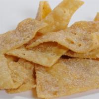 Crispos · Chips sprinkled with cinnamon sugar.