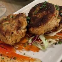  Crab Cakes · Traditional maryland crab cakes, confetti cabbage slaw, and whole grain mustard glaze, caper...