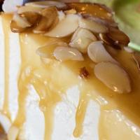 Katzinger'S Cheesecake · Salted caramel sauce, toasted almonds.