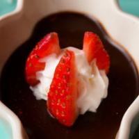 Triple Chocolate Pot De Creme · Rich, dense, dark chocolate custard topped with whipped cream and fresh strawberries.