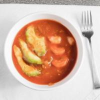 Coctel De Camaron · Includes avocado, onion, tomato, cilantro, and shrimp.
