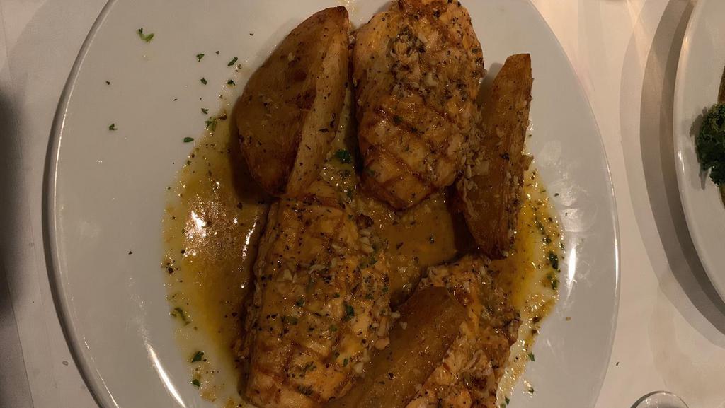 Chicken Vesuvio · Half chicken or boneless breast sautéed in garlic, olive oil and white wine, served with vesuvio potatoes.