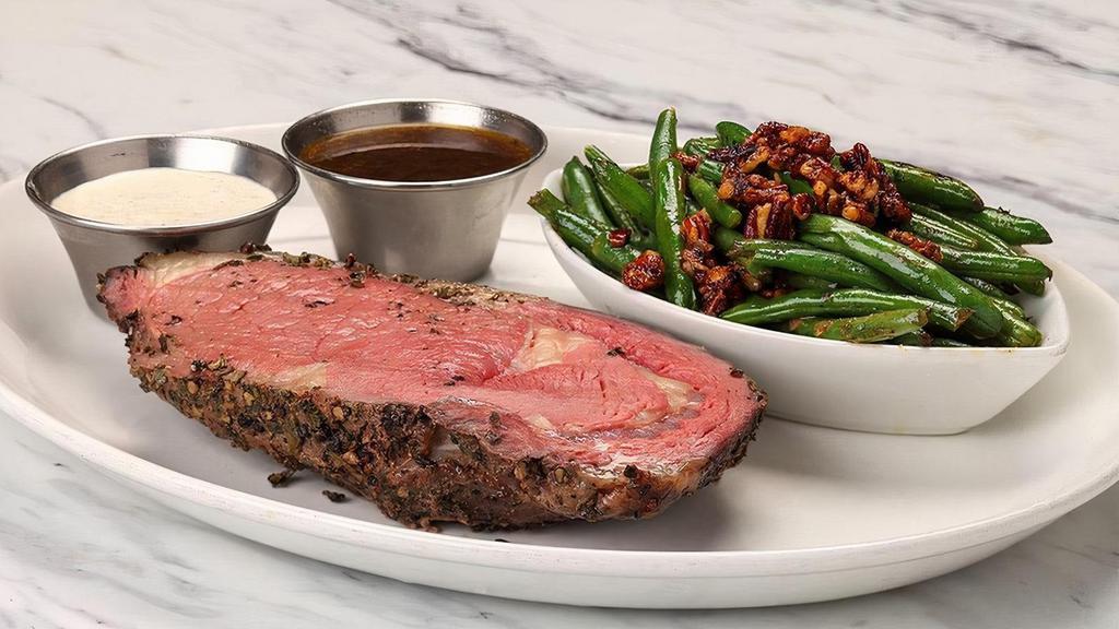 Slow Roasted Prime Rib*    · (Limited availability)  Encrusted with fresh herbs and pepper, hand-carved and served with homemade au jus and choice of side; creamy horseradish sauce by request