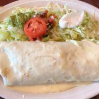 Burrito California · One burrito filled with slow-roasted beef barbacoa, Mexican rice, and refried beans, with ch...