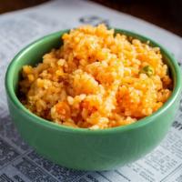 Traditional Mexican Rice · Classic tomato and onion based.