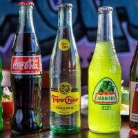Mexican Bottled Soda · Coca-Cola Can/Bottle, Diet Coke Can, Topo Chico, Water Bottle
Jarritos - Fruit Punch, Lime, ...