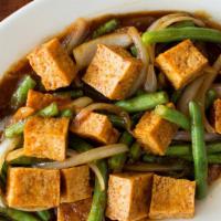 Spicy King Crossing · Stir fried green beans, onions, and garlic in flavorful ginger-chili sauce.