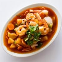 Sweet & Sour Bazaar · Stir-fried in sweet and sour sauce with garlic, bell peppers, onions, cucumbers, and pineapp...