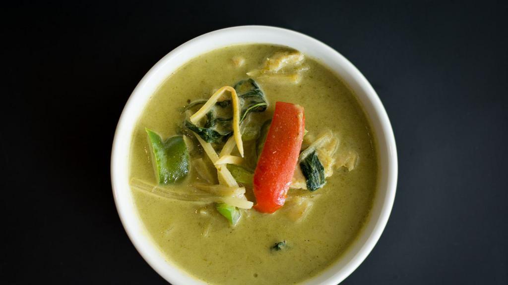 Green Curry · Made without gluten. Bamboo shoots, bell peppers, and basil cooked in spicy green, coconut milk curry.