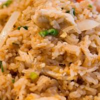Fried Rice · Made without gluten. White rice fried with chicken, egg, garlic, tomatoes, onions, and seaso...