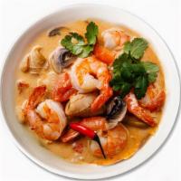 Tom Yum Soup * ツ · Thai spicy and sour soup - mix of Thai herbs, chili paste, mushroom, tomatoes and cilantro. ...
