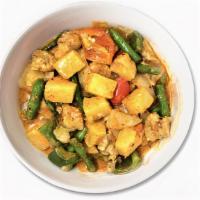 Pineapple Curry* ツ · Bell peppers, pineapple, tomatoes, onion, coconut milk and red curry paste. Served with stea...