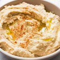 Hummus · Grounded chickpeas, Tahini sauce, Extra virgin olive oil with Greek seasonings . served with...