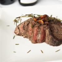 20 Oz Broiled Chateaubriand · large, center-cut of USDA Prime tenderloin, seared with rosemary & garlic.