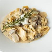 Prhyme Stroganoff · USDA prime beef, house-made pasta, mushrooms, pearl onions, white wine, fresh herbs, creme f...