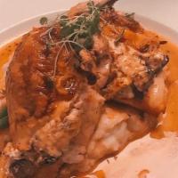 Stuffed Breast Of Chicken · local bird stuffed with goat cheese cream, rosemary, mushrooms, served with smashed potatoes...
