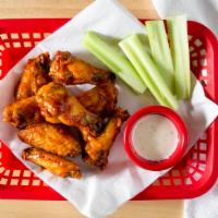 Wings · Popular item. Choose between our three sauces signature hot sauce, Bbq, and sweet Asian chil...