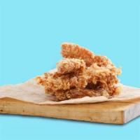 Traditional Tenders (7 Pcs) · Chicken tenders breaded and fried till golden and crisp, served with a choice of dipping sau...