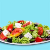 Greek Garden · Classic greek salad with fresh romaine lettuce, feta cheese, cucumber, tomatoes and olives.