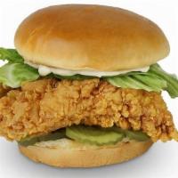 Classic Chicken Sandwich · HAND CUT AND BREADED CHICKEN BREAST TOPPED WITH LETTUCE, PICKLES AND MAYO. SERVED ON A FRESH...