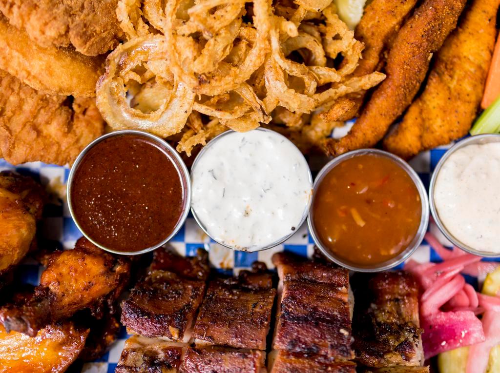 Dave’S Sampler Platter · Southside Rib Tips, Hand-Breaded Chicken Strips, Sweetwater Catfish Fingers, Onion Strings and Traditional or Boneless Wings with choice of sauce. 2550-3200 Cal.
