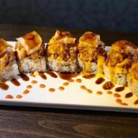 Fuji Mountain · Soft shell crab tempura, cream cheese, avocado topped with torched spicy tuna, spicy mayo an...